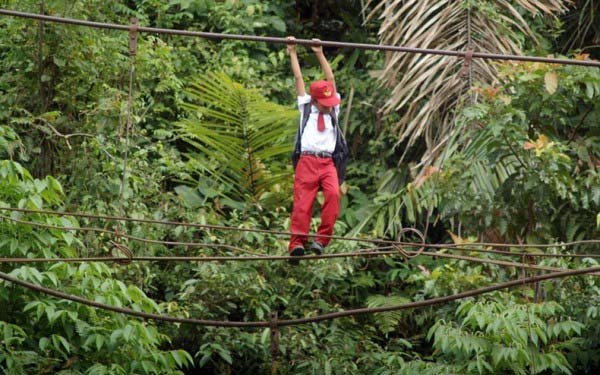 There used to be a reliable bridge near Batu Busuk village in Sumatra, Indonesia, that children could use to get to school.